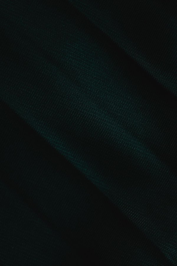 Wool fibre matting assessment showing pile structure damage and recovery potential